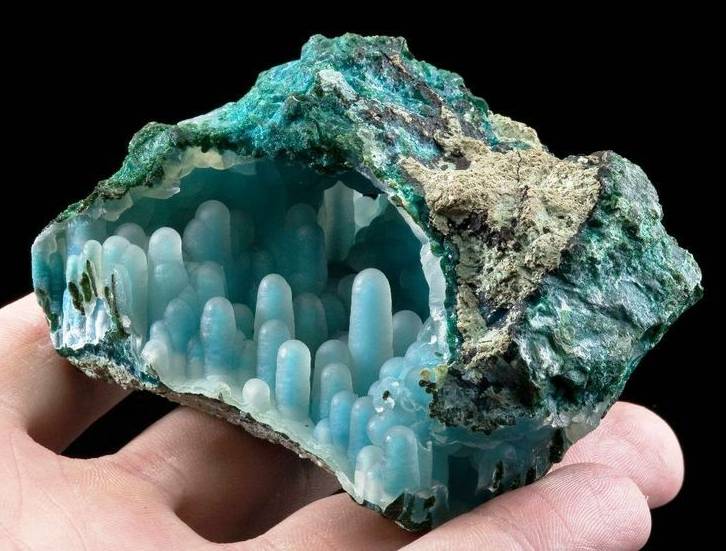A rock with a cave inside it A rock with a cave inside it